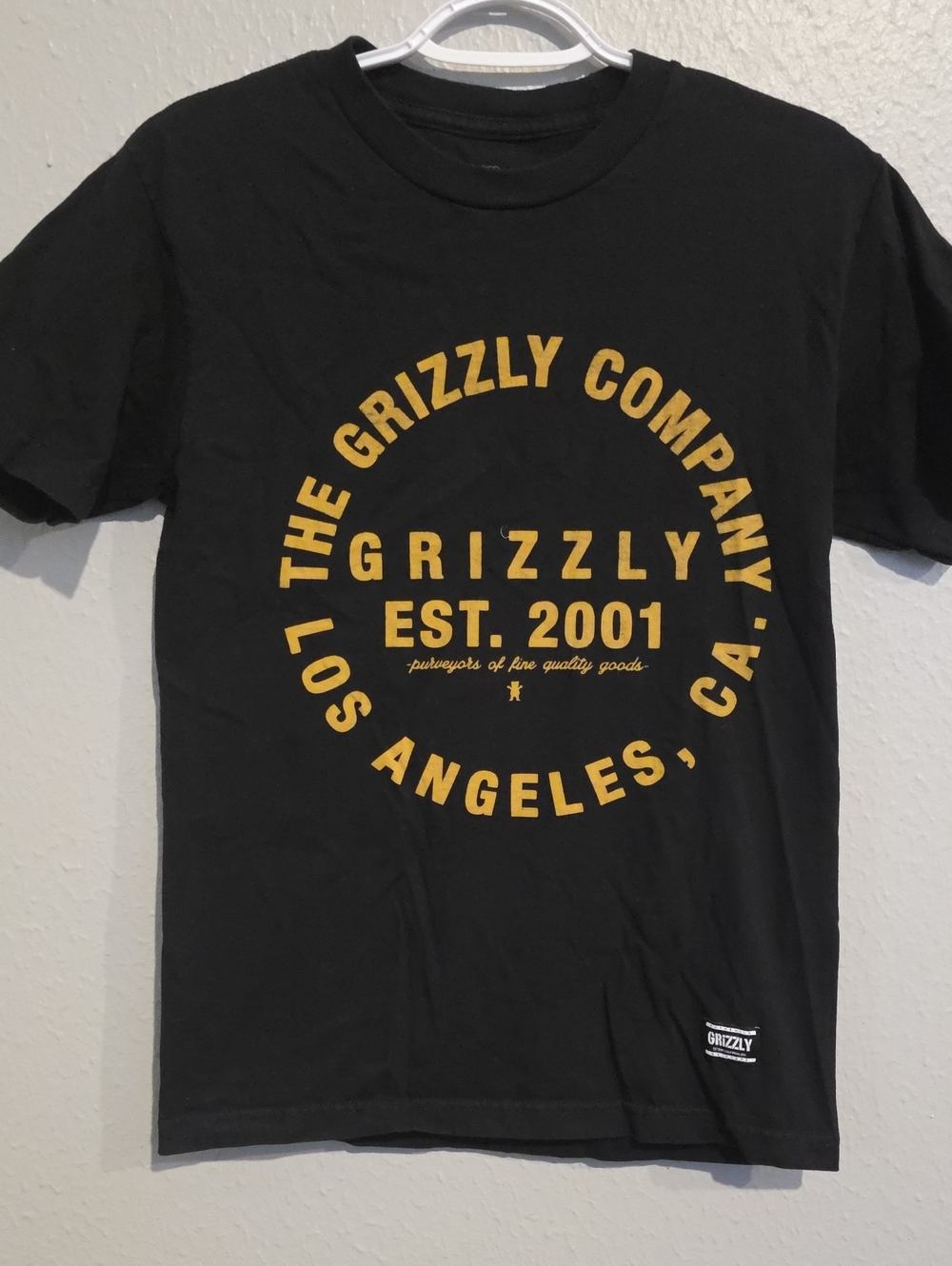 Grizzly Men’s Black Short Sleeve Tee with Gold Logo Print